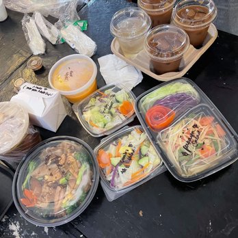 White Springs Cafe - (Left to right)Tom yum soup, pad see ew, free side salad and soup and Thai coffee from lunch combo, papaya salad, - Thai Near Me - Arcadia, California