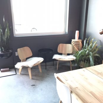 Dose Coffee Company - two chairs and a table - Coffee & Tea Near Me - Red Deer, Alberta