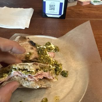 Myke's Pizza - Bite update pic Mortadella Sandwich Pistachio mortadella, stracciatella, pistachio pesto, cracked black pepper and olive oil on pizza bread - Pizza Near Me - Mesa, Arizona Myke's Pizza - Bite update pic Mortadella Sandwich Pistachio mortadella, stracciatella, pistachio pesto, cracked black pepper and olive oil on pizza bread - Pizza Near Me - Mesa, Arizona