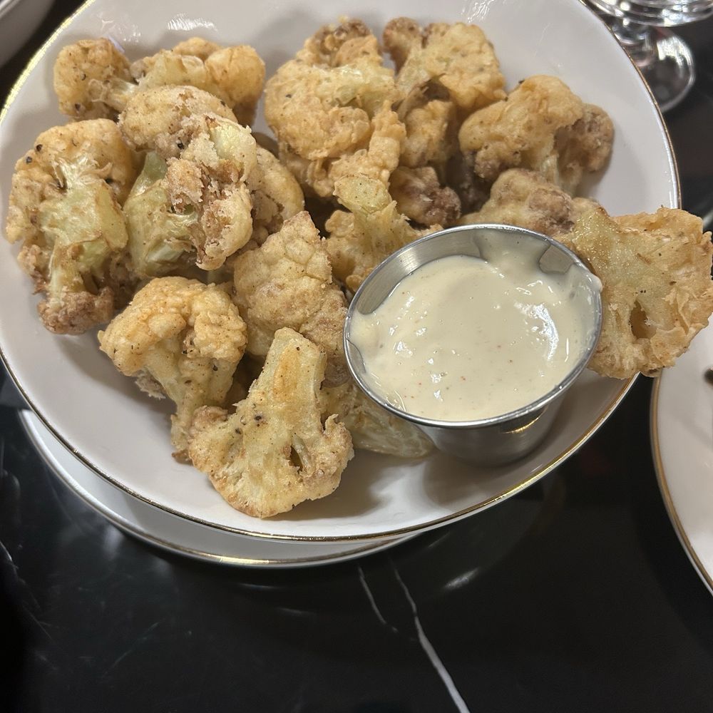 Michael's Restaurant - Cauliflower bite were very tasty and the portion was just right.. - American Near Me - Upper Marlboro, Maryland