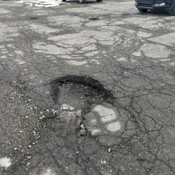 Denny's - Another large pot hole in the parking lot. If u don't gall in it if snow covered, then hope it doesn't mess up ur tire. - Diners Near Me - Belle Vernon, Pennsylvania