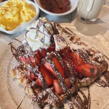 Zinneken's Belgian Waffles - Liege Waffle with strawberries, Nutella, and whipped cream, side of Bacon - Coffee & Tea Near Me - Glastonbury, Connecticut Zinneken's Belgian Waffles - Liege Waffle with strawberries, Nutella, and whipped cream, side of Bacon - Coffee & Tea Near Me - Glastonbury, Connecticut