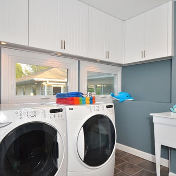 Leni Studio - Custom laundry room cabinetry shaker style doors with the be bored detail self-closing features on all the doors - Interior Design Near Me - Palm Beach Gardens, Florida