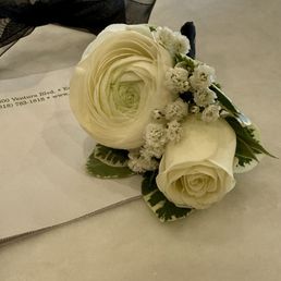 White Ranunculus and Spray Rose Boutonniere