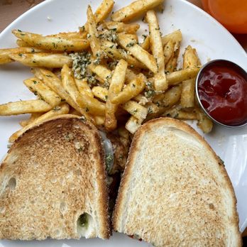 The Patio at Sloans - Grilled Chicken Sandwich (with pesto) and a side of truffle fries - Bars Near Me - Denver, Colorado The Patio at Sloans - Grilled Chicken Sandwich (with pesto) and a side of truffle fries - Bars Near Me - Denver, Colorado