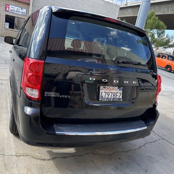 Valenz Autobody - Fixed Caravan in front of Valenz auto body shop - Body Shops Near Me - Riverside, California