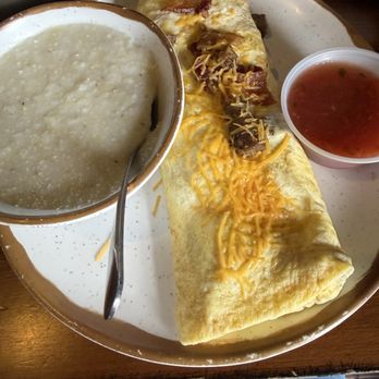 Old West Cafe - Meat lovers with grits that has bacon, cheese and tomato - Breakfast & Brunch Near Me - Grapevine, Texas
