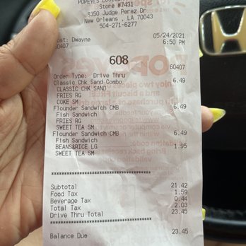 Popeyes Louisiana Kitchen - a person holding a receipt - Fast Food Near Me - Chalmette, Louisiana Popeyes Louisiana Kitchen - a person holding a receipt - Fast Food Near Me - Chalmette, Louisiana