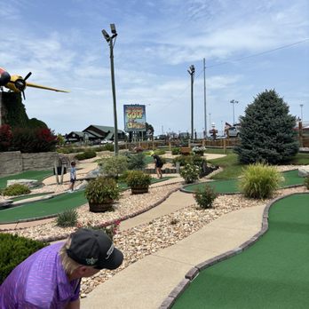 Lost Treasure Golf - Billy putting away - Mini Golf Near Me - Branson, Missouri Lost Treasure Golf - Billy putting away - Mini Golf Near Me - Branson, Missouri