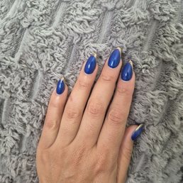 gel x manicure with gold color chrome French tips