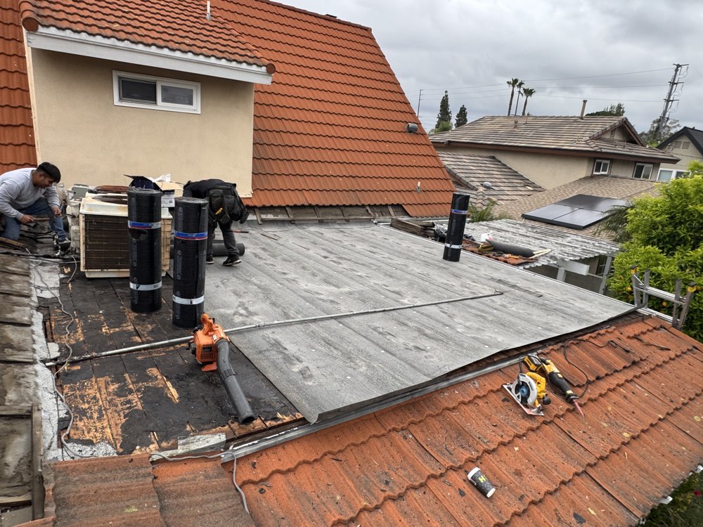 Slide of Aguilar Roofin Repair