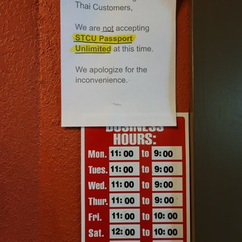 Bangkok Thai - a sign on the door of a restaurant - Thai Near Me - Spokane, Washington