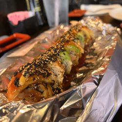 Miyoshi Japanese Restaurant - This is the big reveal Love Fire roll after the fire dies down and it is delish