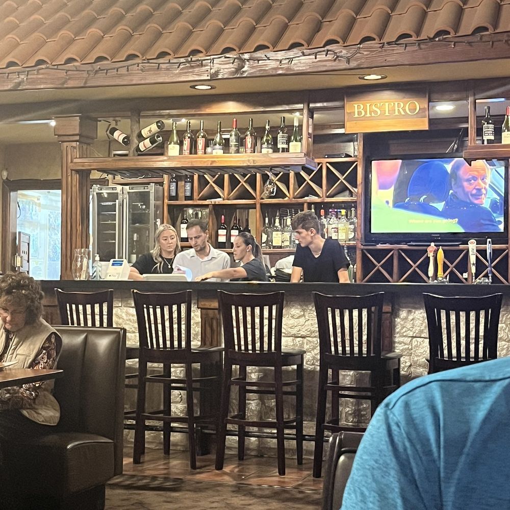 All the staff chatting and on their phones, while people waited on their food. All the staff chatting and on their phones, while people waited on their food.