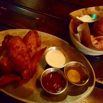 Public House - Wings were ok. Dipping sauces unique and good. Hush puppies.. I wouldn't order again. Maple butter good and prosciutto delicious. - Cocktail Bars Near Me - Ferndale, Michigan