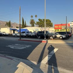 Romel's Auto Upholstery - Street shot of business
