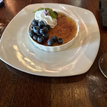 Greg Norman Australian Grille - Blueberry crème brûlée - Seafood Near Me - North Myrtle Beach, South Carolina Greg Norman Australian Grille - Blueberry crème brûlée - Seafood Near Me - North Myrtle Beach, South Carolina