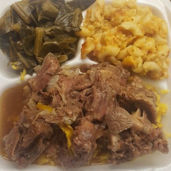 The Rolling Rooster - Oxtail plate w/2 sides: collards and M&C. Yum! - Chicken Wings Near Me - Austin, Texas
