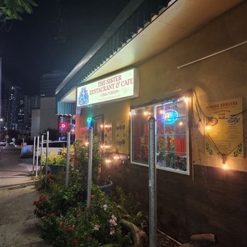 The Sister Restaurant & Cafe - The outside of the restaurant. There is parking in front of Pink Rabbit for The Sister restaurant as well. - Thai Near Me - Honolulu, Hawaii The Sister Restaurant & Cafe - The outside of the restaurant. There is parking in front of Pink Rabbit for The Sister restaurant as well. - Thai Near Me - Honolulu, Hawaii