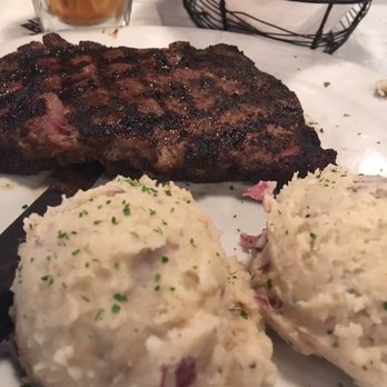 The Black Molly Grill - Ribeye cooked medium with garlic mashed potatoes - American Near Me - St. Augustine, Florida