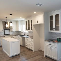 Secor Painting - Kitchen Cabinet Refinish. Conversation of natural stained wood cabinets to new solid White Lacquer