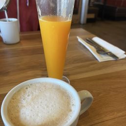 Freshly squeezed orange juice and Cafe Latte Freshly squeezed orange juice and Cafe Latte