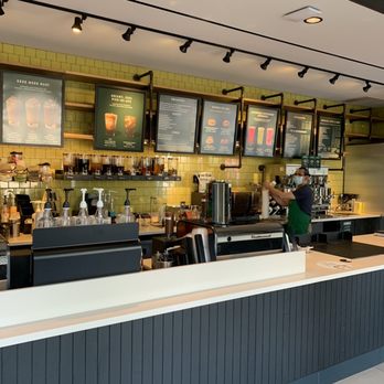 Starbucks - a coffee shop with menus on the wall - Coffee & Tea Near Me - Toronto, Ontario Starbucks - a coffee shop with menus on the wall - Coffee & Tea Near Me - Toronto, Ontario