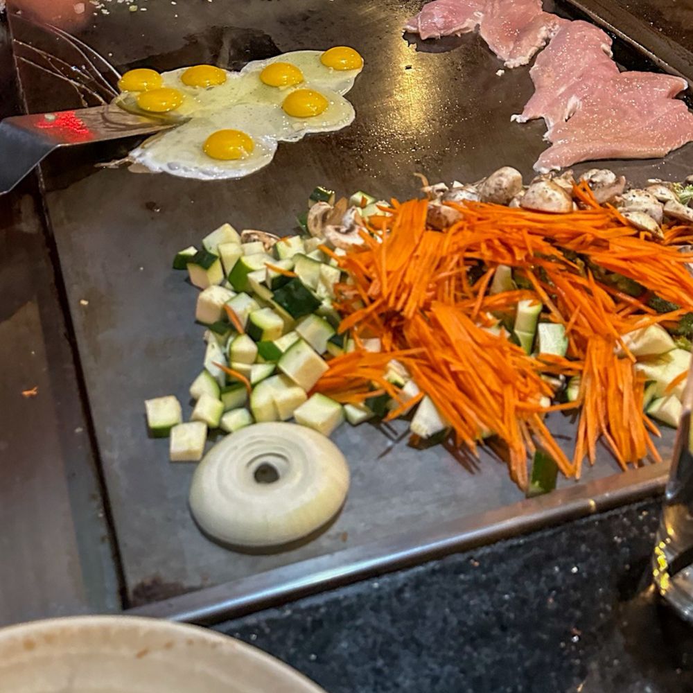 Hana Tokyo - a person preparing food - Sushi Bars Near Me - Peoria, Arizona Hana Tokyo - a person preparing food - Sushi Bars Near Me - Peoria, Arizona