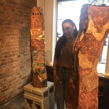 WallWorks - The Artist: Gavy Castro amongst her work. - Art Galleries Near Me - Bronx, New York