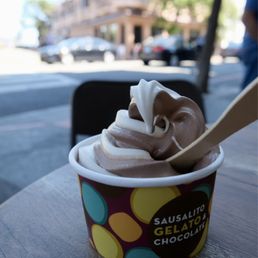 a cup of ice cream on a table a cup of ice cream on a table