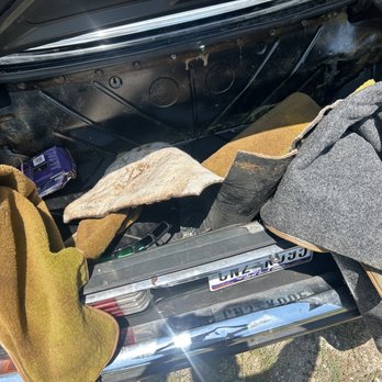 Nevco Auto Repair - Trunk carpet all torn out, same with battery cover - Auto Repair Near Me - Houston, Texas Nevco Auto Repair - Trunk carpet all torn out, same with battery cover - Auto Repair Near Me - Houston, Texas