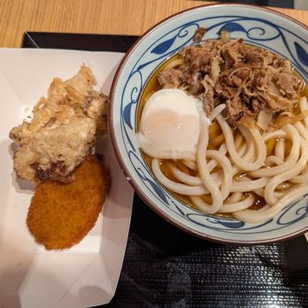 Marugame Udon - Fried chicken and fried potato on the left. Regular size Nikutama on the right. - Japanese Near Me - Arcadia, California