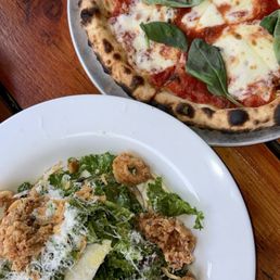 Calamari kale salad and margarita pizza Calamari kale salad and margarita pizza