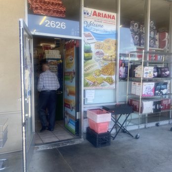 Anwar Bazaar & Bakery - a man entering the store - Grocery Near Me - San Jose, California Anwar Bazaar & Bakery - a man entering the store - Grocery Near Me - San Jose, California