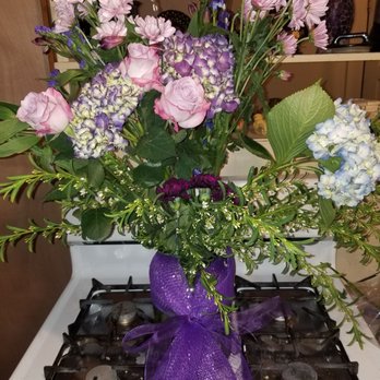 University Flowers - After I put them in a gallon pickle jar. - Florists Near Me University Flowers - After I put them in a gallon pickle jar. - Florists Near Me