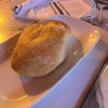 The Stinking Rose - House made bread that comes with the Bagna calda. Not enough bread for four people, we needed to ask for an additional Baguette. - Italian Near Me - San Francisco, California The Stinking Rose - House made bread that comes with the Bagna calda. Not enough bread for four people, we needed to ask for an additional Baguette. - Italian Near Me - San Francisco, California