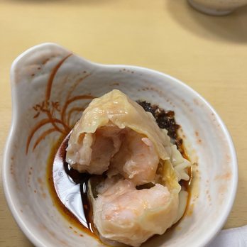 The Congee - a bowl of food on a table - Chinese Near Me - Alhambra, California The Congee - a bowl of food on a table - Chinese Near Me - Alhambra, California