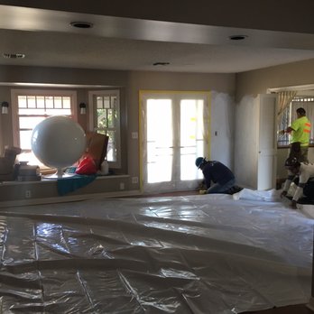 Nielsen Environmental - Prepping.  Plaster sealing walls and spaces so that all areas could be mist + water sprayed before scraping - General Contractors Near Me - Los Angeles, California