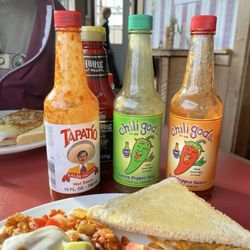 Rollerville Cafe - There were 5 bottles of spicy sauces- and food arrived well flavored,