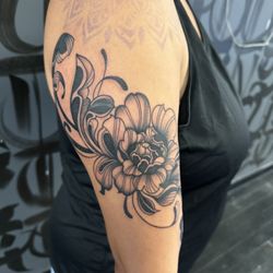 Starting my sleeve off right with Sev_tattoos. Floral work. 5/28/24.