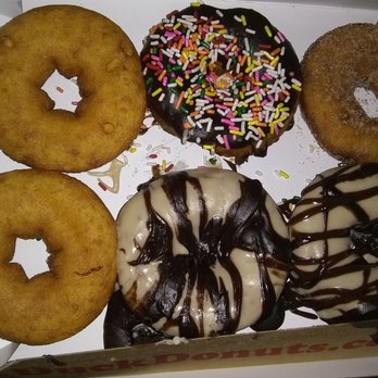 Duck Donuts - 2 regular (vanilla), 2 peanut butter and chocolate, 1 chocolate rainbow, and 1 cinnamon sugar. - Donuts Near Me - Cary, North Carolina Duck Donuts - 2 regular (vanilla), 2 peanut butter and chocolate, 1 chocolate rainbow, and 1 cinnamon sugar. - Donuts Near Me - Cary, North Carolina