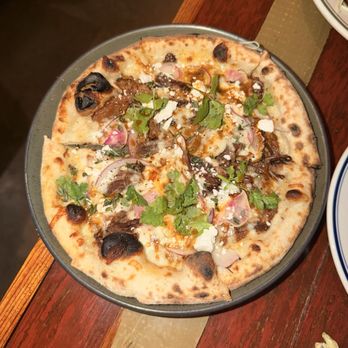 Odd Duck - braised goat pizza: yummm - American Near Me - Austin, Texas