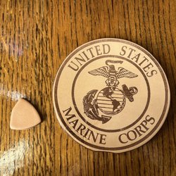 River Ridge Leather - I bought a coaster with my military service and a guitar pick to try out. Both made of leather.