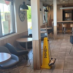 McDonald's - The other dining room nice comfy sitting chairs although where the booths are it's hard plastic chairs the booths are nice and soft