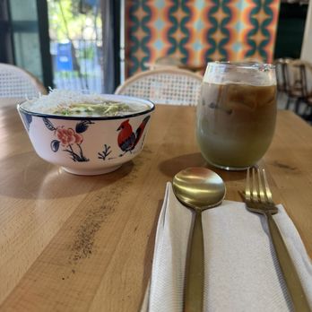 Sapha Kafae - Jok Sapha (rice congee, loaded with flavorful toppings). Oliang (Robusta coffee brewed with corn and roasted sesame, sweetened and iced). - Cafes Near Me - Sacramento, California Sapha Kafae - Jok Sapha (rice congee, loaded with flavorful toppings). Oliang (Robusta coffee brewed with corn and roasted sesame, sweetened and iced). - Cafes Near Me - Sacramento, California