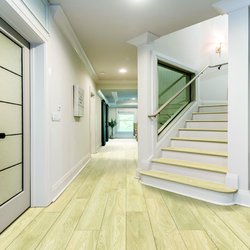 Flooring and More - Natural colored LVP setting off the room.