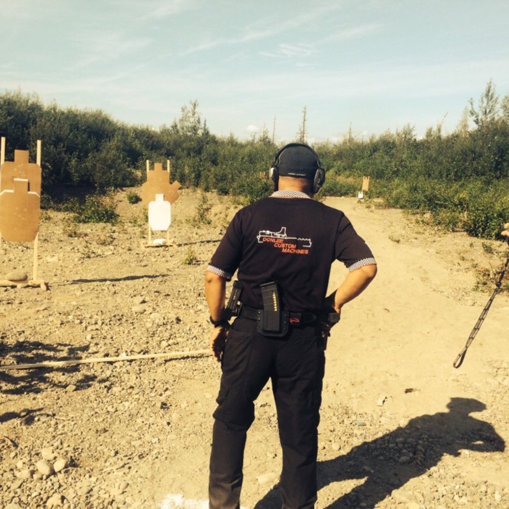 Birchwood Recreation & Shooting Park - My dad, Manny Aurigue, getting ready for a dual weapon stage at Birchtree during the Three Gun Competition on August 2-3, 2014! - Gun/Rifle Ranges Near Me - Chugiak, Alaska
