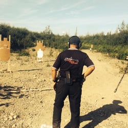 Birchwood Recreation & Shooting Park - My dad, Manny Aurigue, getting ready for a dual weapon stage at Birchtree during the Three Gun Competition on August 2-3, 2014!
