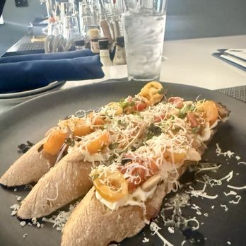 Ivory House - Tomato Bruschetta - Cocktail Bars Near Me - Cincinnati, Ohio Ivory House - Tomato Bruschetta - Cocktail Bars Near Me - Cincinnati, Ohio