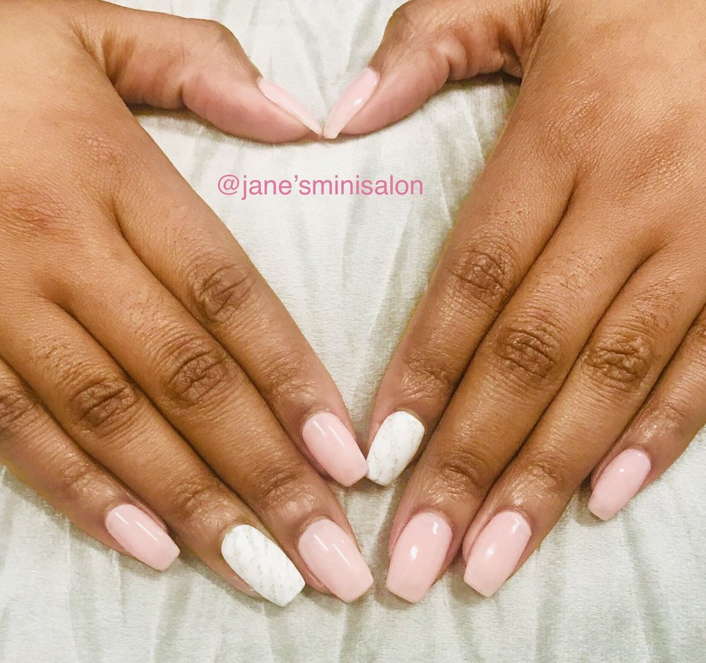 Jane’s mini Salon Logo